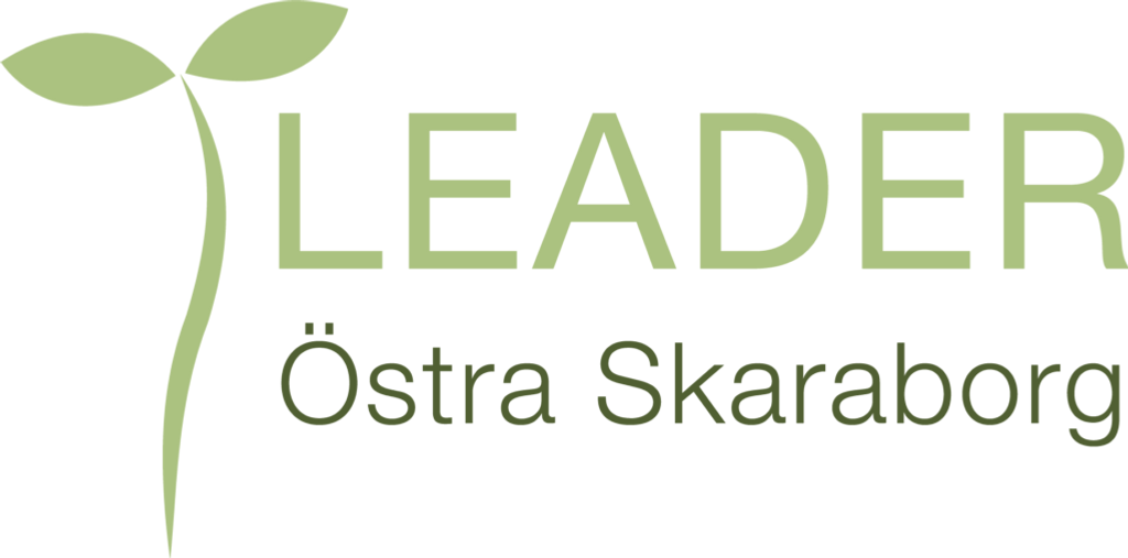 Logotypen för ett företag med en växt som växer ut ur den.