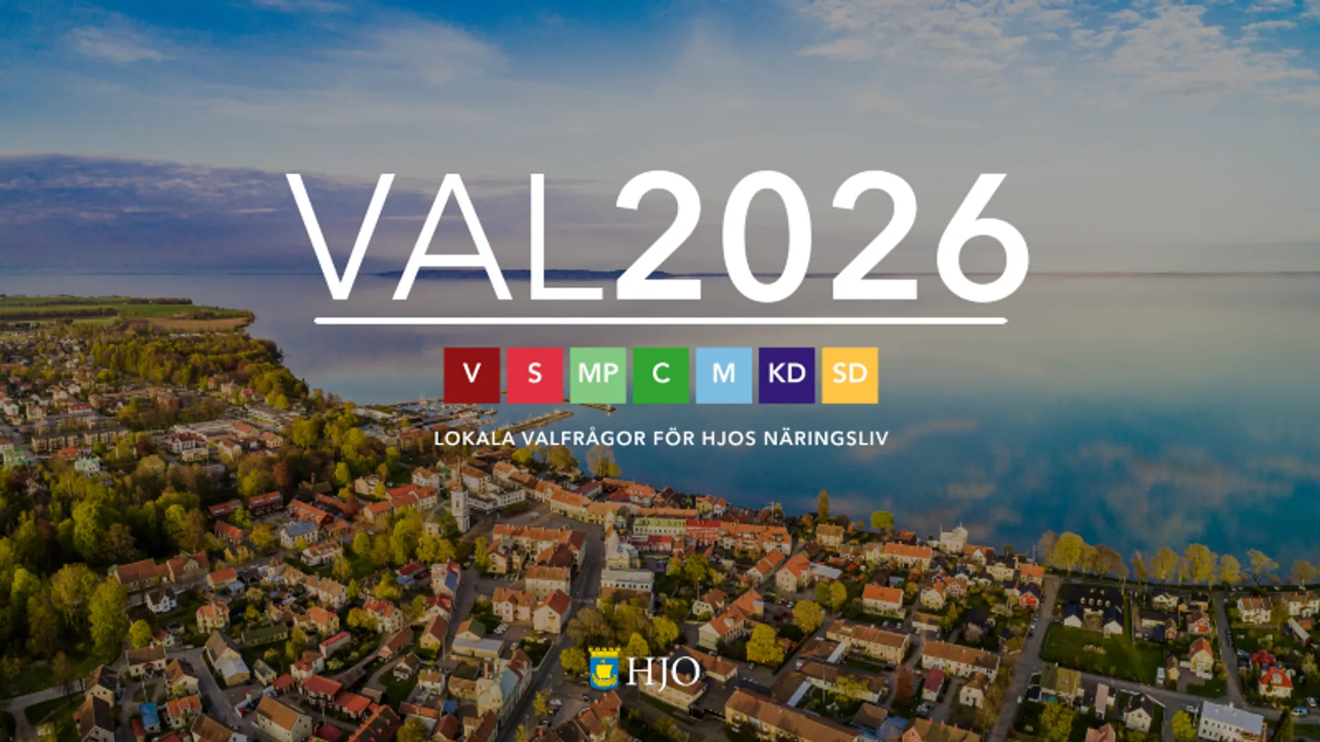 En flygbild över en stad med texten val2026.